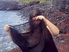 Does Curvy Brunette Masturbate Naked on Beach During Sexy Photoshoot?