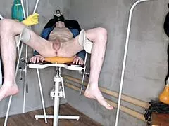 nurse slips on rubber gloves to give patient enema then strokes his cock with firm handjob grip