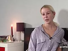 Sexy blonde babe spreads legs wide for intimate dildo play close-up