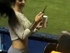 Whoa, check out that sexy MILF's tight little ass shaking in leggings at the stadium!
