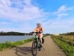 Big Natural Tits MILF Bikes Naked Outdoors Teasing Everyone?