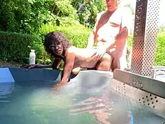 Nudist swan gets wild outdoors under sunny skies