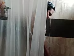 latina milf caught fingering her wet pussy in shower by sneaky voyeur