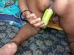 Watch Indian MILF Housewife Drill Juicy Pussy with Cucumber to Creampie Moans!