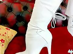 lady lucy chills in white thigh boots