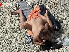 dude this beach voyeur spot on summer vacation shore is perfect for watching her flash pussy