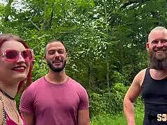 a fiery redhead trixy surrenders her tight body to two throbbing cocks in steamy threesome action