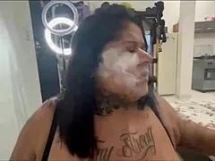 bbw latina milf with huge saggy tits smokes cigar during blowjob