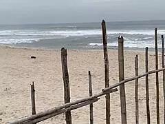 sexy african babe flashing her trimmed pussy thong on naughty public beach?