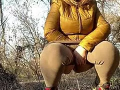 wanna see this mature milf squat low and pee from her wet pussy?