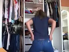 My stepmom's huge ass slips into tight jeans teasing me while I stroke hard