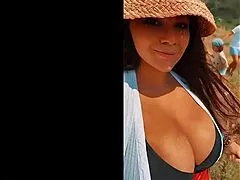Busty Italian bombshell milf struts her big tits outside in spring sunshine