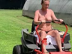 Hey neighbor's wife rides lawnmower naked outdoors flashing huge tits public group fetish