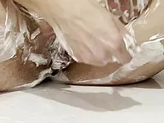 omg super hot blonde babe shaves her smooth shaved cunt in steamy shower