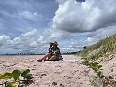 Curvy milf sneaks hairy pussy flashes on crowded public beach