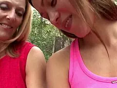 After gardening, Alissa and Brenda share sensual kisses and licks.