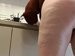 hey check out my half-sister flashing thong in the kitchen