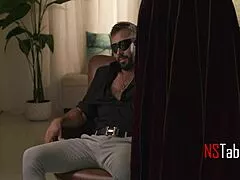 Dominatrix straps on leather shoes to roughly ride submissive lover.