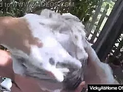 Vicky Vette rubs wet cunt blissfully after steamy outdoor shower