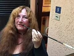 😈 hey augusta's lighting up that extra long holder while fingering her milf pussy like a total fetish slut