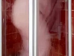 sexy milf housewife strips in hot steamy bathroom shower tease