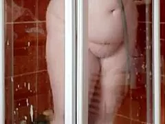 sexy milf housewife strips in hot steamy bathroom shower tease