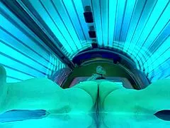 girlfriend veronica squirts hard on tanning bed cam while spreading shaved pussy