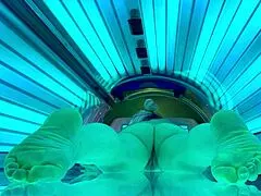 girlfriend veronica squirts hard on tanning bed cam while spreading shaved pussy