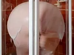 sexy milf housewife strips in hot steamy bathroom shower tease