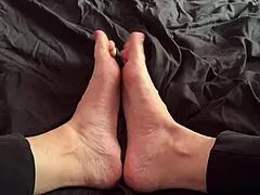 Artemisia Love shows off feet in playful POV camera tease