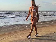 gorgeous blonde in bikini enjoys sensual massage turning steamy