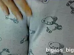 Curvy milf rubs her camel toe in tight pajamas