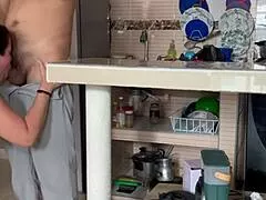 madrastra masturbates in kitchen with huge tits