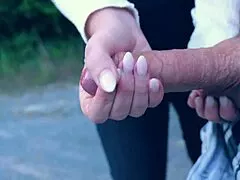 public parking lot handjob gets sloppy with big tit cumshot