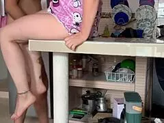 madrastra masturbates in kitchen with huge tits