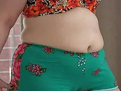 A beautiful bbw with big ass masturbates on table for orgasm